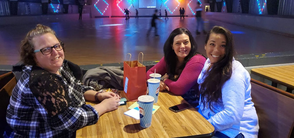 L.A.S.E.R. Skating Center | Guests Sitting in Booth